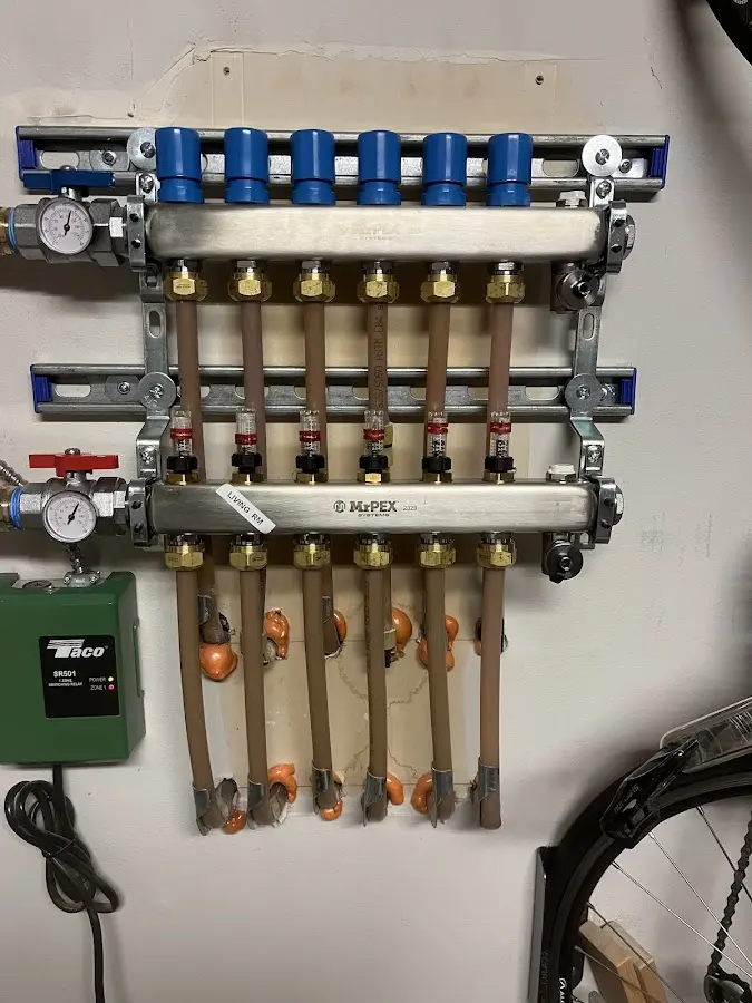 Plumber performing Water Heater Repair at a residential property in Fountain